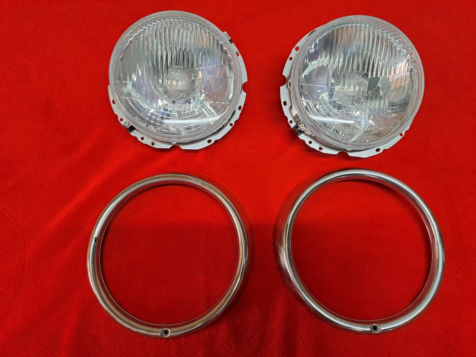 Hella H4 koplamp unit met gepolijste RVS koplampring 2x, Ophalen of Verzenden, Nieuw