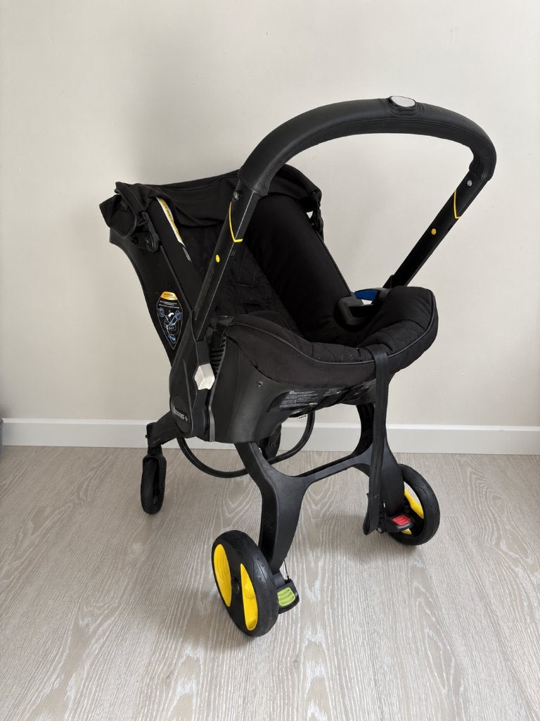 Doona+ Midnight Special Edition + Isofix + accessoires, Gebruikt, Isofix, 0 t/m 13 kg, Ophalen