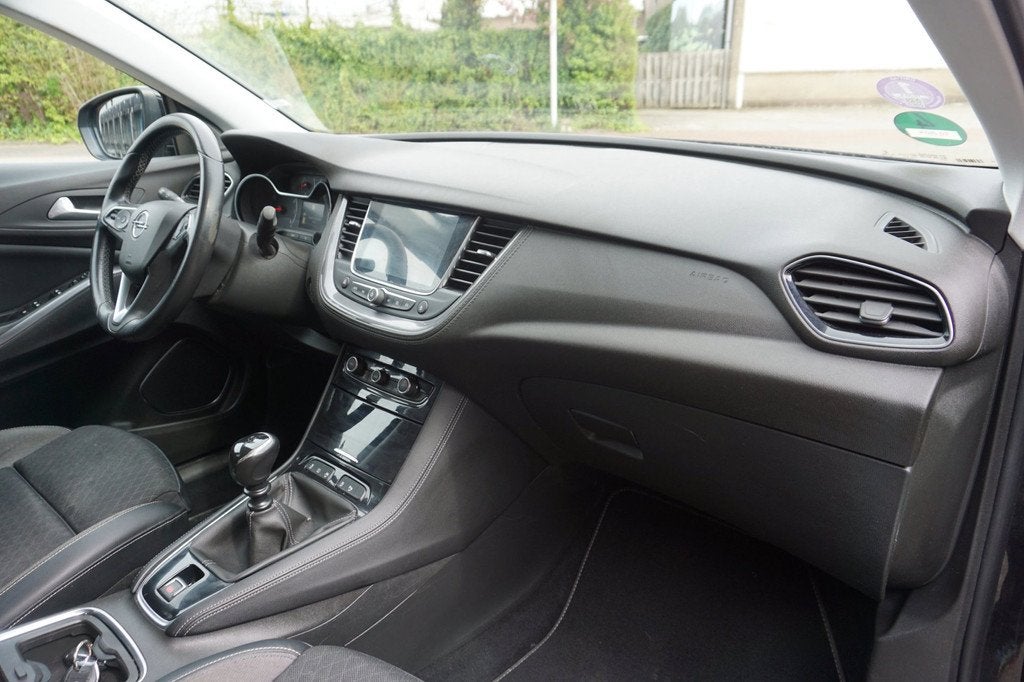 Opel Grandland X 1.2 Turbo Business Executive * Nieuwe Motor, Auto's, Voorwielaandrijving, Stof, Gebruikt, 1199 cc
