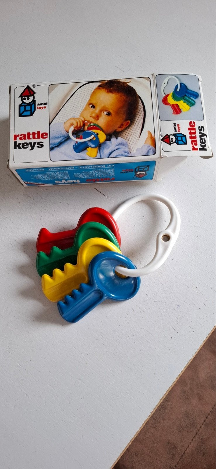 Ambi toys ratelende sleutels, inclusief doosje, Ophalen of Verzenden, Zo goed als nieuw, Rammelaar
