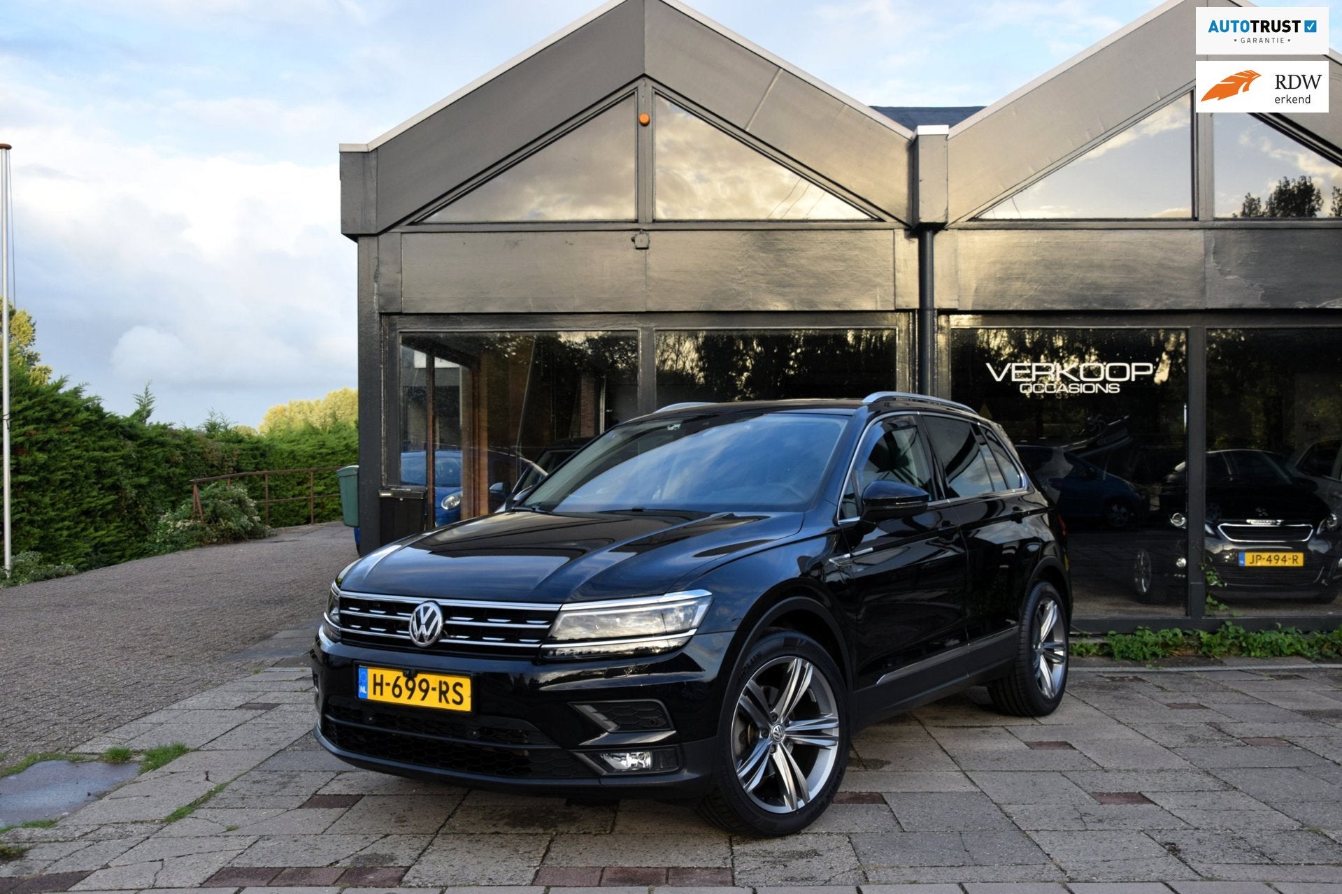 Volkswagen Tiguan 1.5 TSI ACT Comfortline Business Schuifdak, Auto's, Voorwielaandrijving, 4 cilinders, 150 pk, Zwart