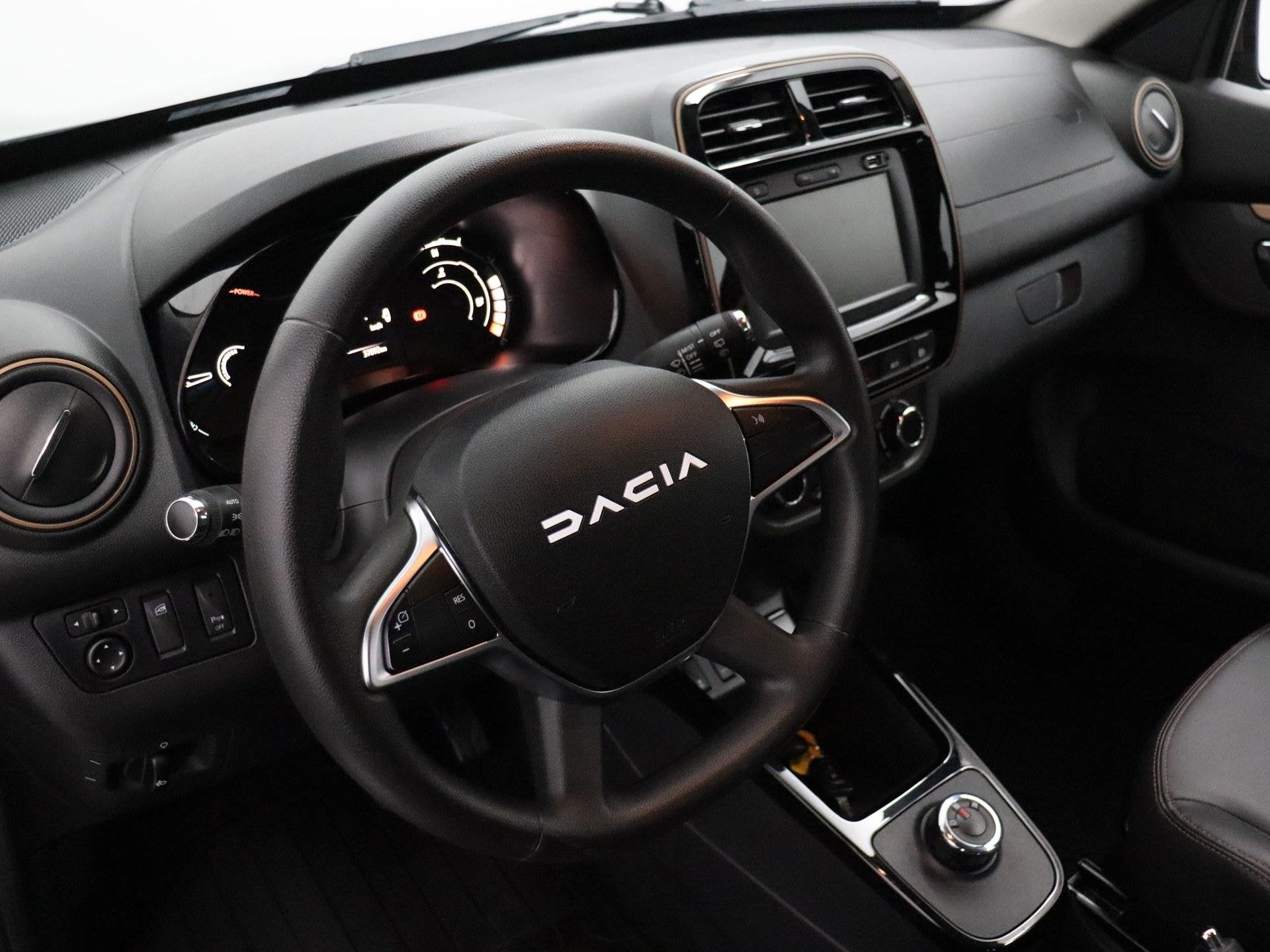 Dacia Spring Extreme 27 kWh AUTOMAAT | SNELLADER | NAVI | PD, Auto's, Gebruikt, Zwart, 4 stoelen, 291 min