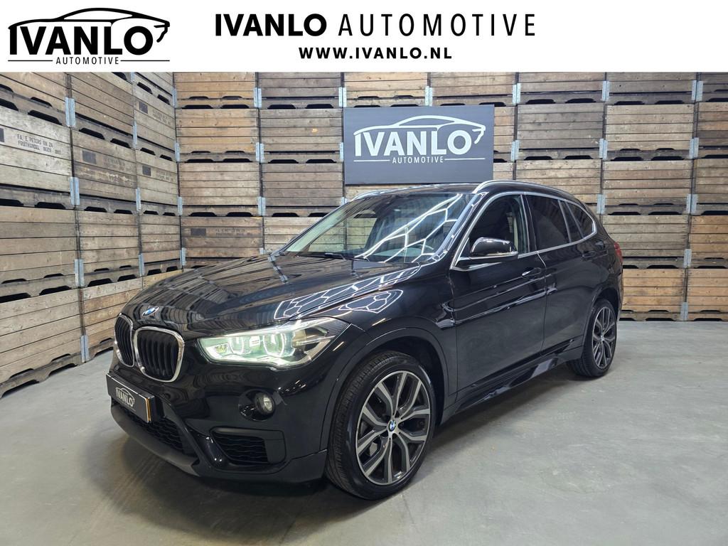 BMW X1 SDrive20i Centennial Executive Xenon Navi Airco Cruis, Auto's, BMW, 1998 cc, Stof, Zwart, Origineel Nederlands