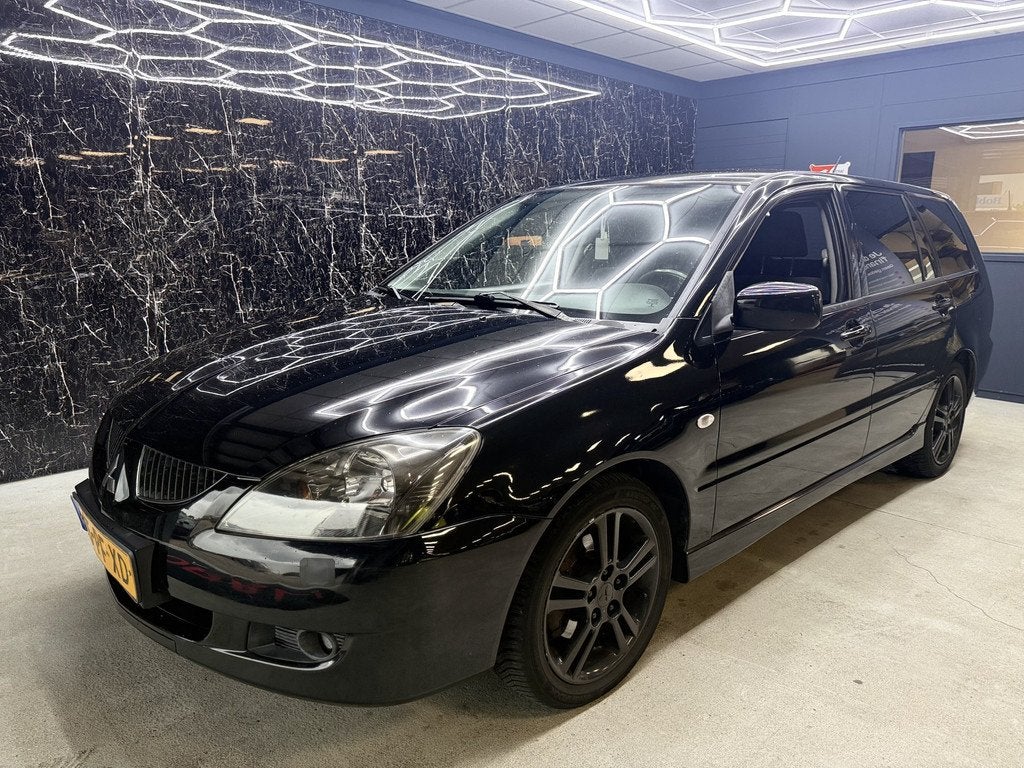 Mitsubishi Lancer Station Wagon 1.6 Sport (bj 2004), Auto's, Voorwielaandrijving, Gebruikt, 4 cilinders, 400 kg