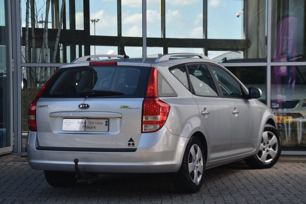 Kia Cee'd Sporty Wagon 1.4 CVVT | Airco | Trekhaak | Cruise, Auto's, Kia, Voorwielaandrijving, Stof, Gebruikt, Zwart