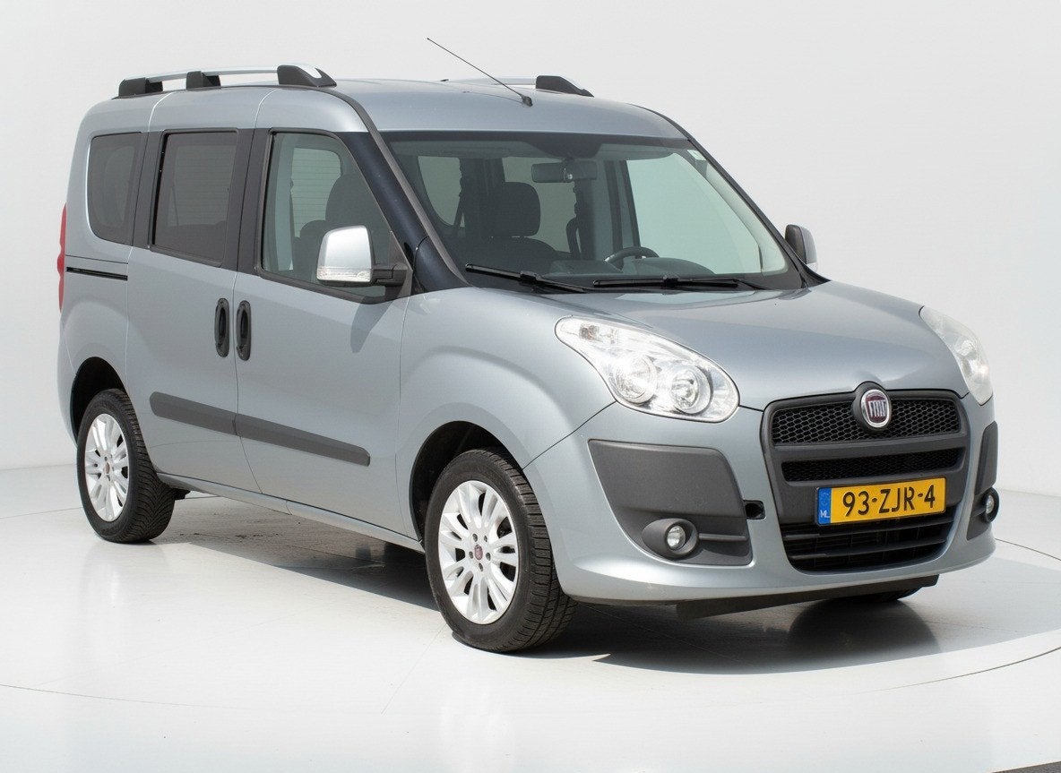 Fiat Doblò 1.4 T-Jet Emotion|Cruise|Clima|Trekhaak|Schermpj, Auto's, Fiat, Voorwielaandrijving, Euro 5, Stof, Gebruikt
