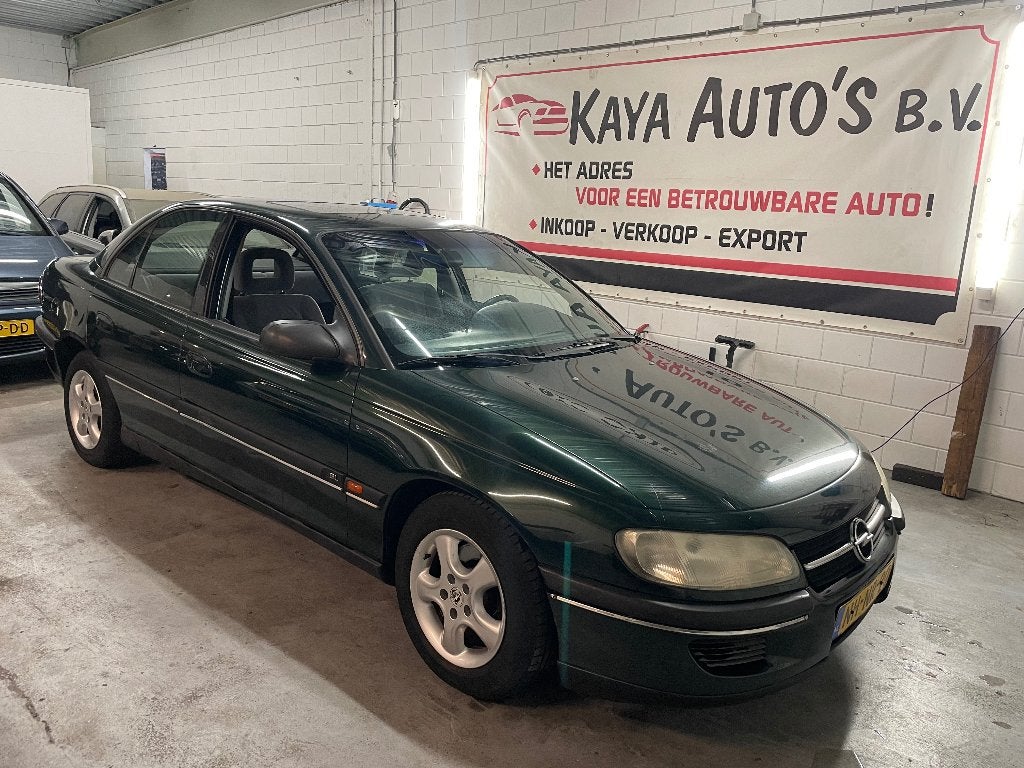 Opel Omega 2.0 I 16V AUT E2 1996 Groen, Auto's, Opel, Automaat, 1440 kg, 4 cilinders, Origineel Nederlands