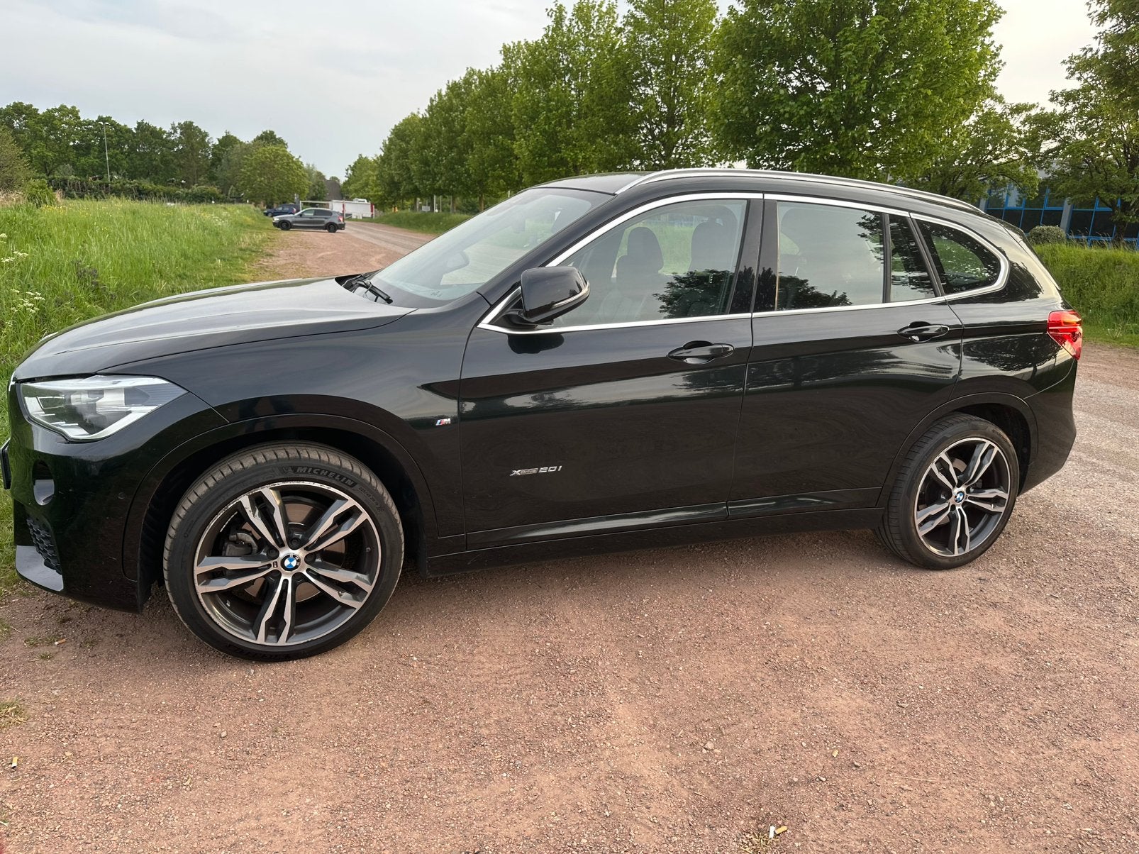 BMW X1 20I Xdrive Aut8 2016 Zwart, Auto's, 1998 cc, Zwart, 2000 kg, Zwart