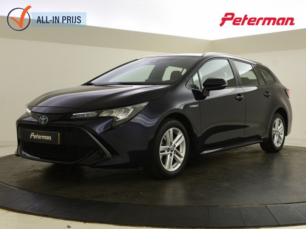 Toyota Corolla Touring Sports 1.8 Hybrid Active | Trekhaak |, Auto's, Automaat, Gebruikt, 4 cilinders, Blauw