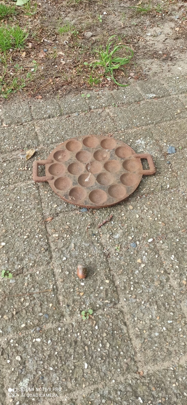 poffertjespan gietijzer, Ophalen