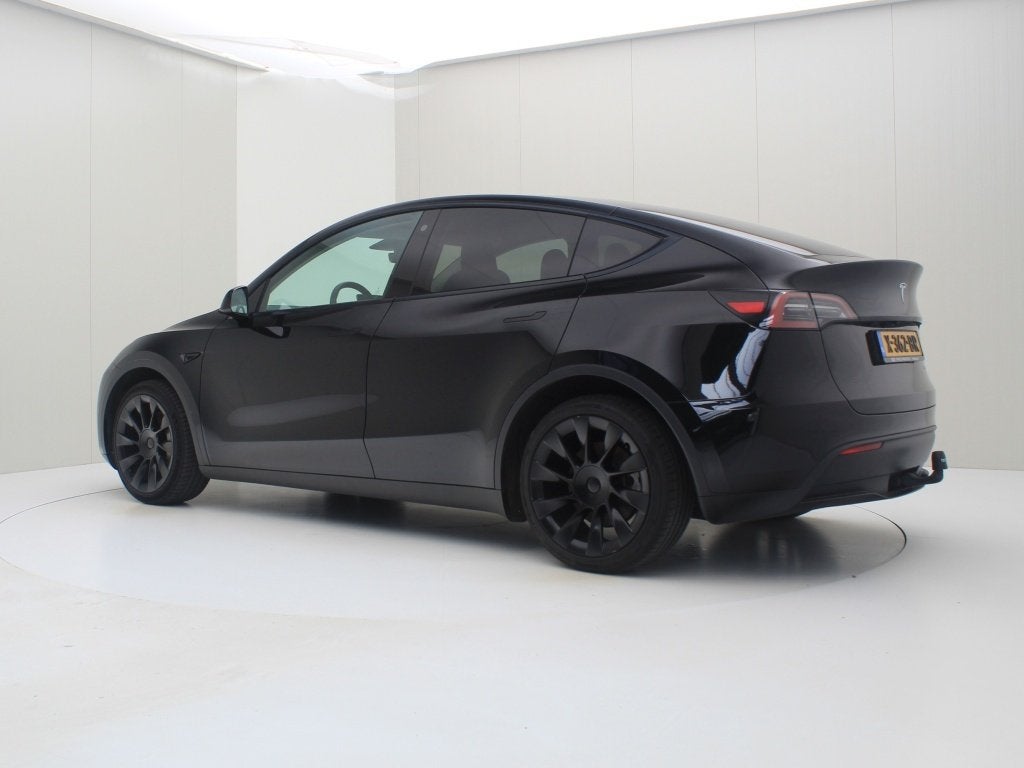 Tesla Model Y Long Range 345pk AWD [ TREKHAAK+AMD RYZEN+20 I, Auto's, 104 €/maand, 0 cilinders, Gebruikt, Zwart