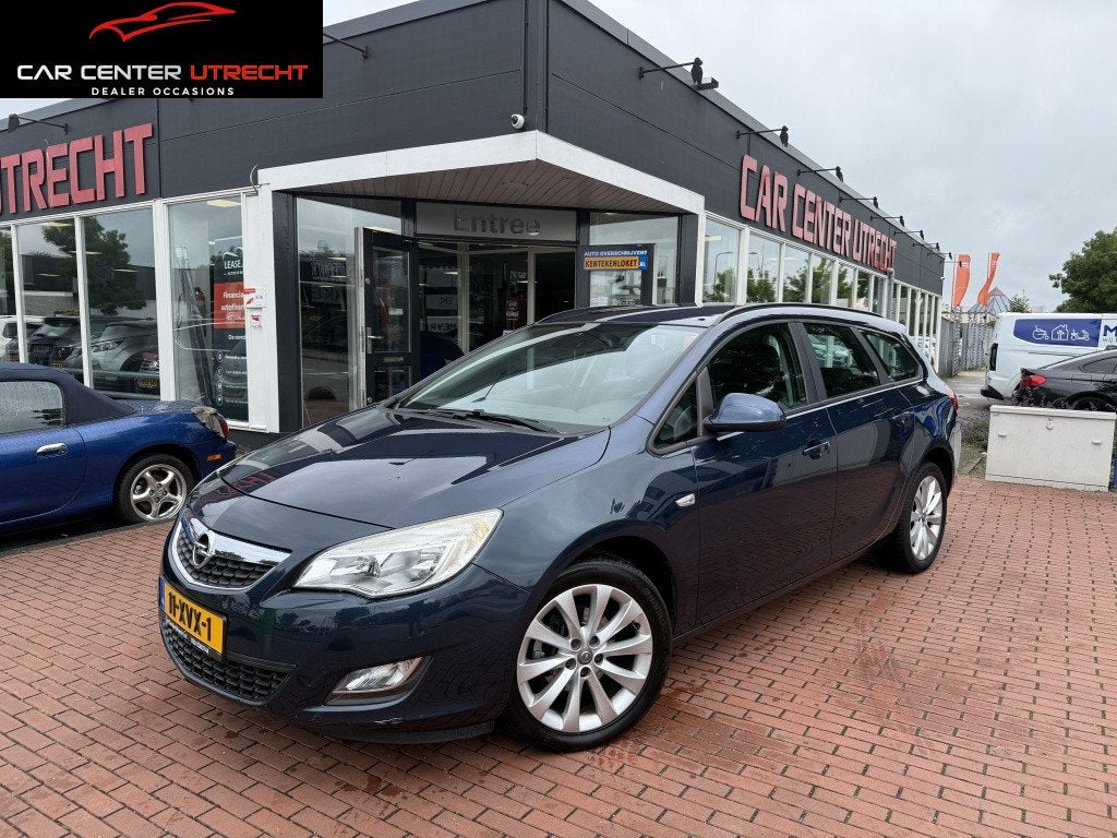 Opel Astra Sports Tourer 1.4 Turbo Edition | trekhaak | airc, Euro 5, Gebruikt, 4 cilinders, Blauw