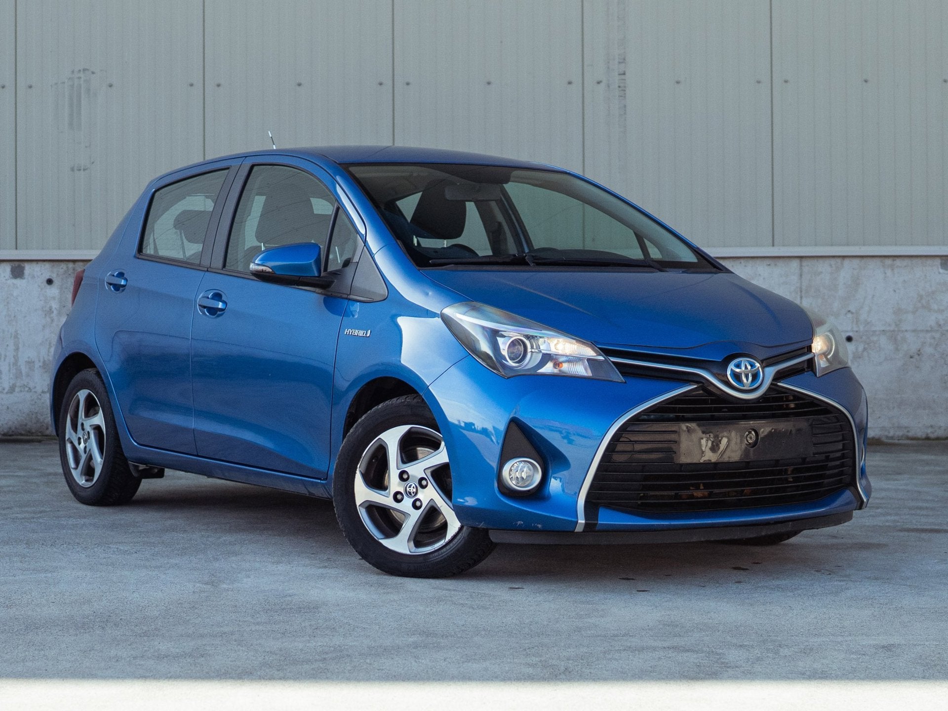 Toyota Yaris 1.5 Hybrid Aspiration, Stof, Gebruikt, Zwart, Blauw
