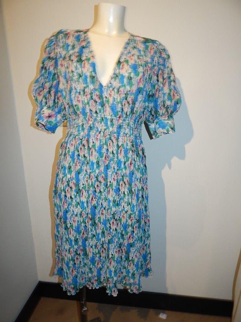 Ganni hemels blauwe jurk plooitjes stretch stof pof mouw M