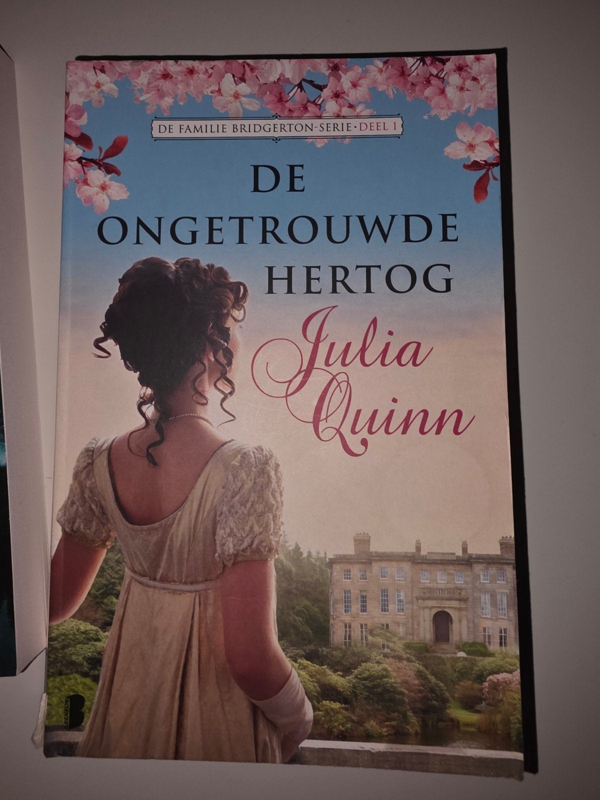 Julia quinn De ongetrouwde hertog, Boeken, Ophalen of Verzenden, Zo goed als nieuw