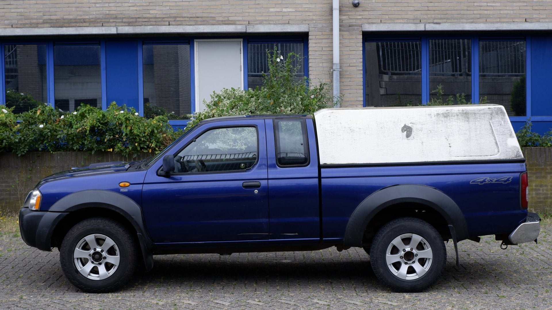 Nissan Pick-up 2.5 DTi King Cab 4 x 4, Auto's, Stof, Gebruikt, 4 cilinders, 133 pk