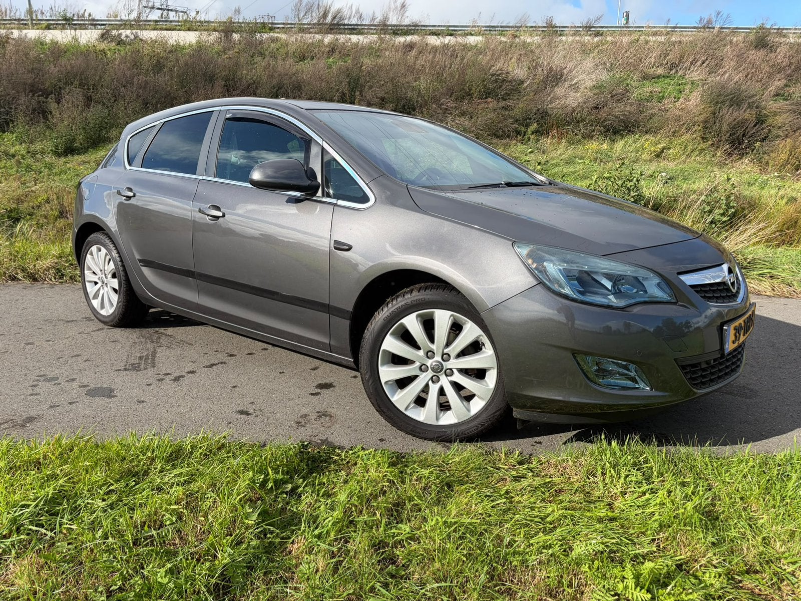 Opel Astra 1.4 Turbo Ecotec 88KW 5D 2012 Grijs, Auto's, Voorwielaandrijving, 680 kg, 4 cilinders, Origineel Nederlands