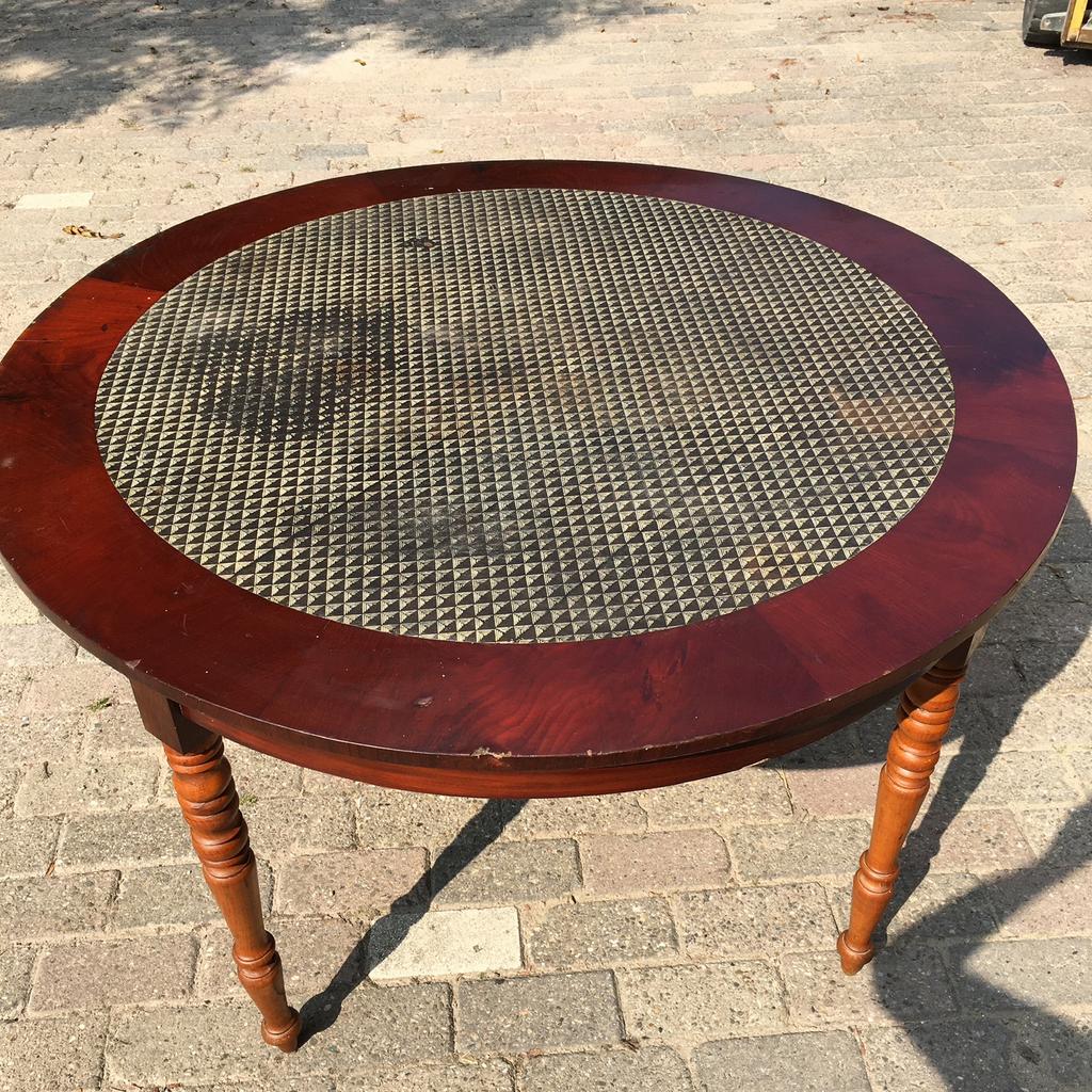 Antieke ronde tafel van mahonie, Ophalen