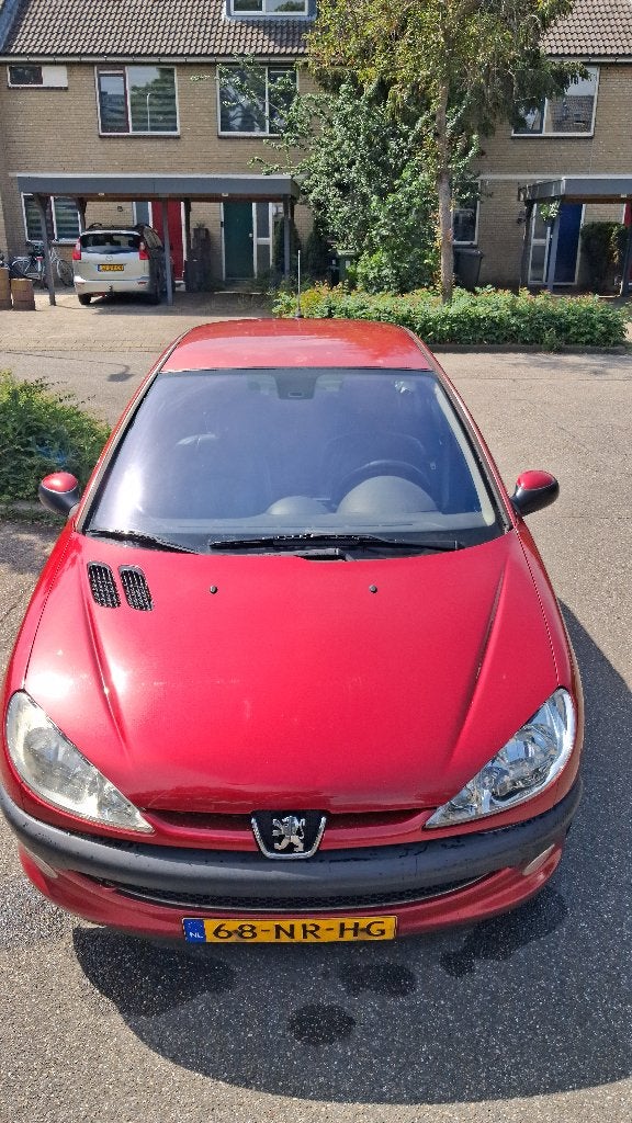 Peugeot 206 1.4 16V XT 5D 2004 Rood Benzine, Auto's, Peugeot, Voorwielaandrijving, 1360 cc, 31 €/maand, 4 cilinders