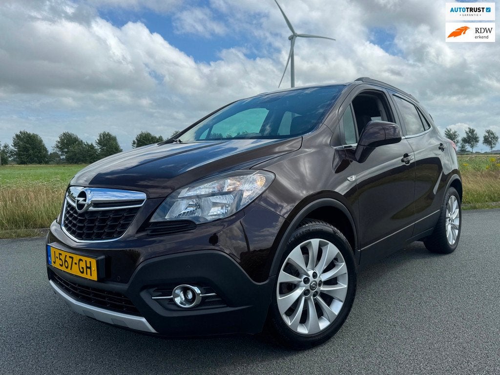Opel Mokka 1.4 T Cosmo Navi Cruise Clima Camera Trekhaak, Auto's, Opel, Voorwielaandrijving, Euro 5, Gebruikt, 4 cilinders