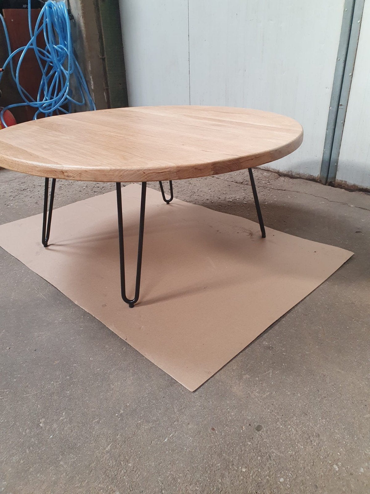 Ronde eiken salontafel, Ophalen