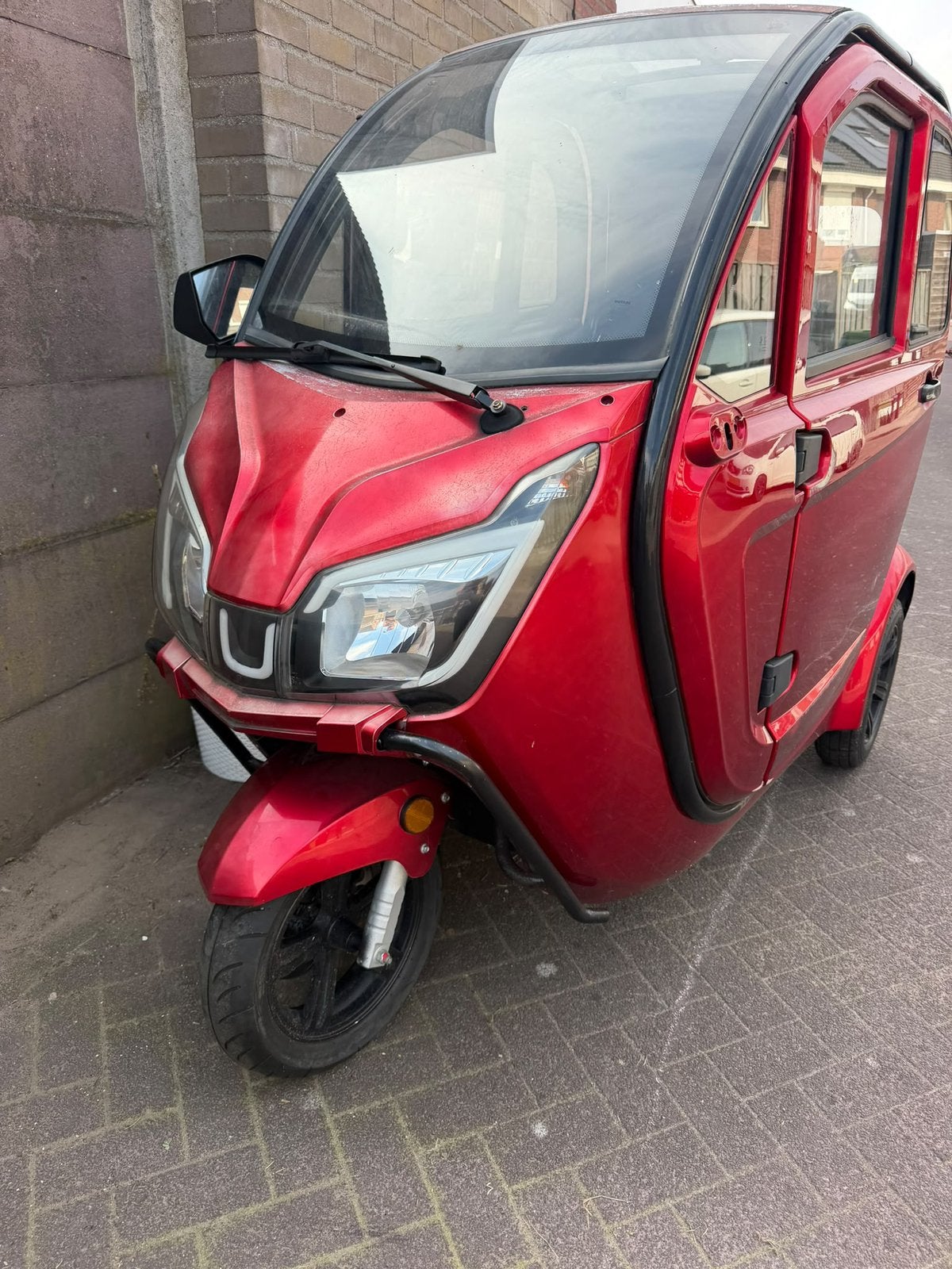 Overdekte scootmobiel opknapper