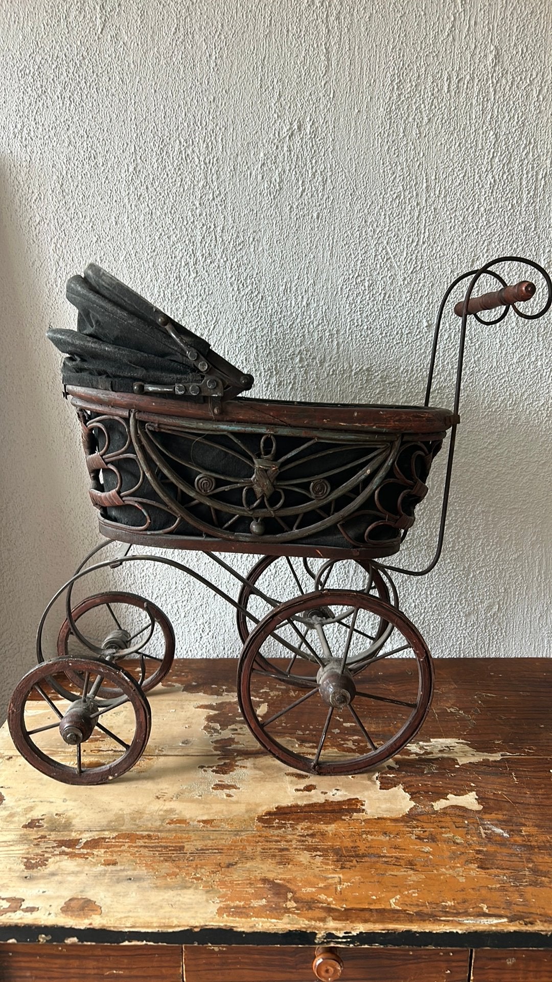Antieke poppenwagen, Ophalen