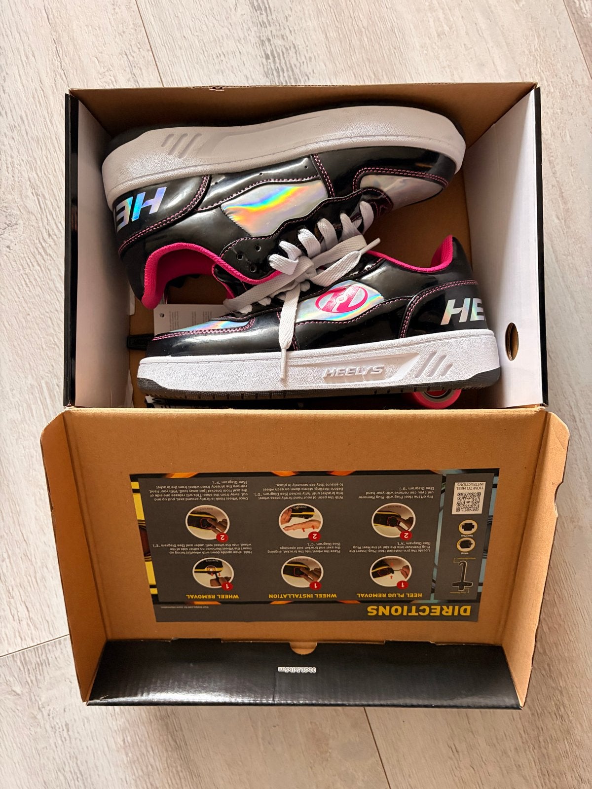 Heelys rolschoenen - Maat 35 - Zwart/Roze, Kinderen en Baby's, Ophalen of Verzenden, Zo goed als nieuw, Kinderen