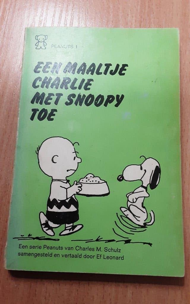 Charles M. Schultz - Een maaltje Charlie met Snoopy toe, Ophalen of Verzenden, Snoopy, Zo goed als nieuw, Boek of Spel