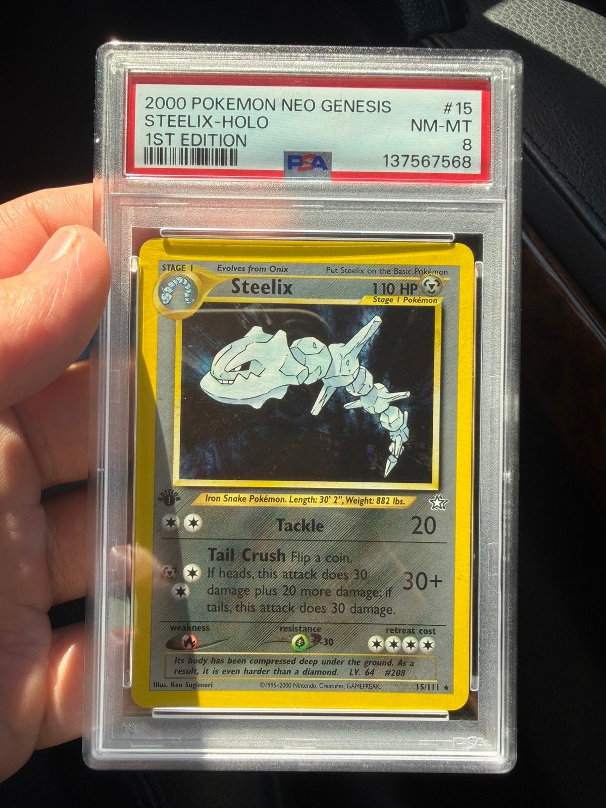 Pokémon Steelix Holo 15/111 Neo Genesis 1ST EDIT. 2000–PSA 8, Ophalen of Verzenden, Zo goed als nieuw