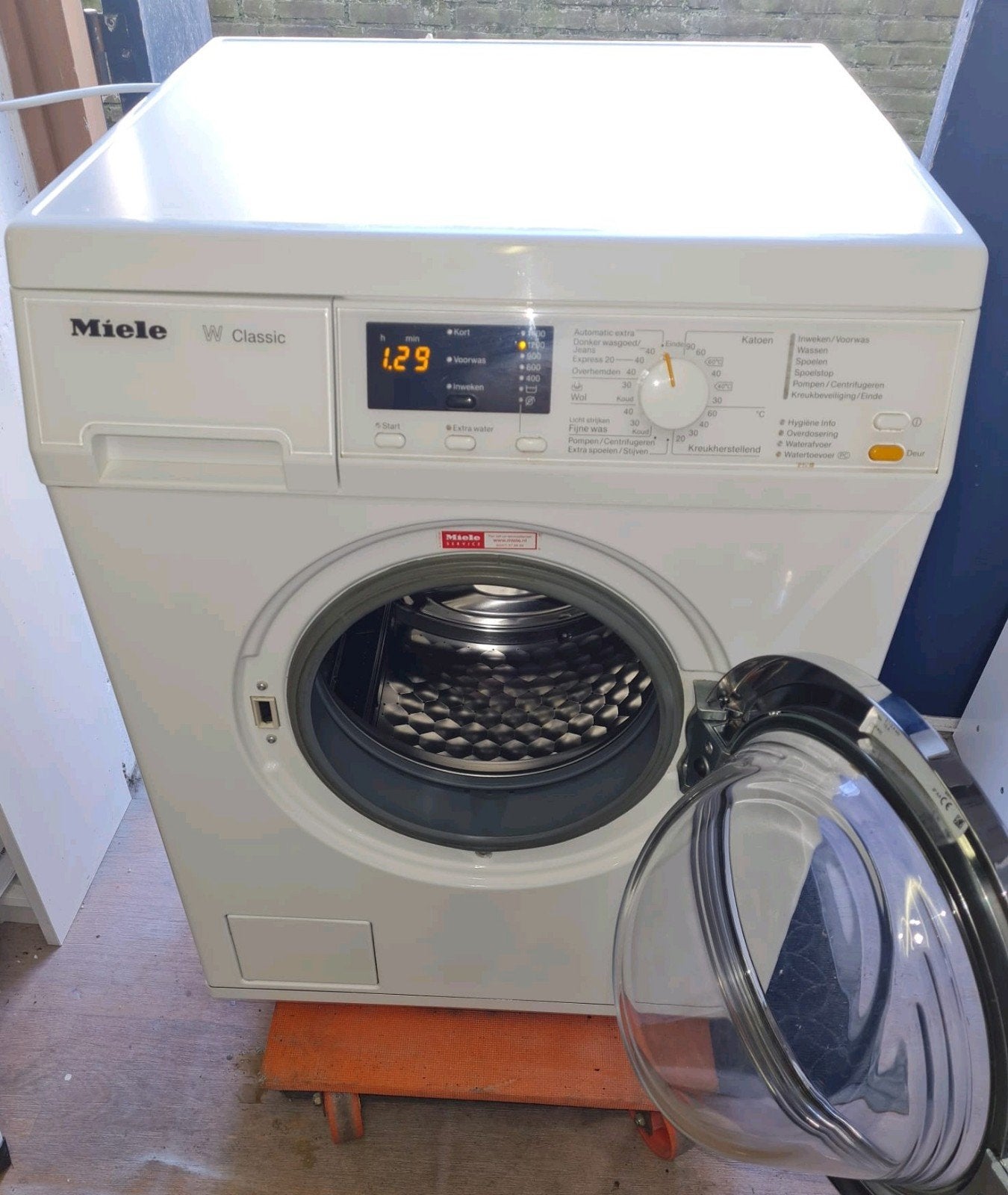 Wasmachine Miele, Ophalen