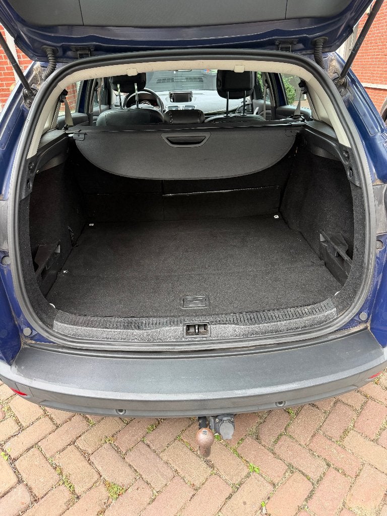 Foto 22 van Renault Mégane 1.5 DCI 81KW Estate 2012 met winterbanden