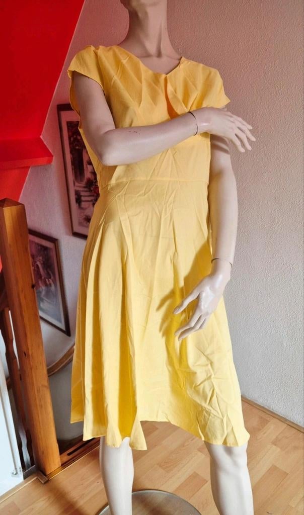 Mooie gele zomerjurk L. Nieuw. Okselmaat 46 cm lengte 104 cm, Kleding | Dames, Ophalen of Verzenden, Nieuw, Geel