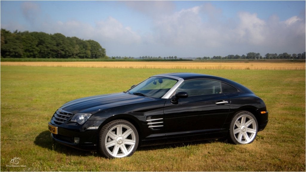 Chrysler Crossfire 3.2 V6 (2004) – Nog geen 56.000 km!, Auto's, Chrysler, Automaat, Zwart, 75 €/maand, Onderhoudsboekje