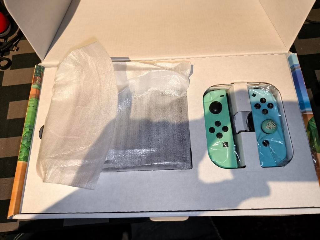 Nintendo Switch Animal Crossing Editie + joycons + case, Ophalen of Verzenden, Zo goed als nieuw, Eén computer, 3 spelers of meer