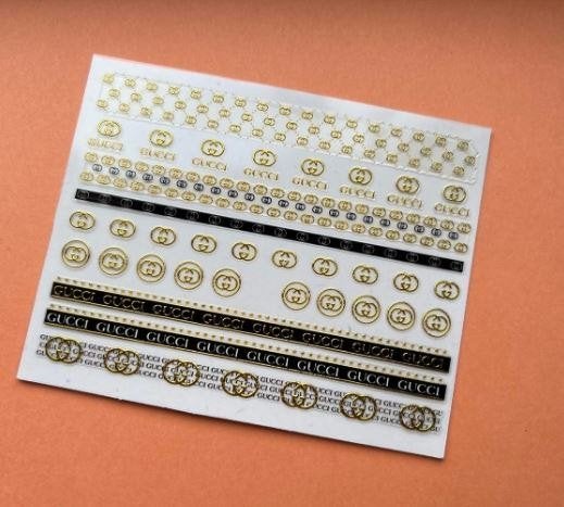 nagelstickers de luxe goud G ucci (155), Nieuw, Ophalen of Verzenden, Handen en Nagels, Goud