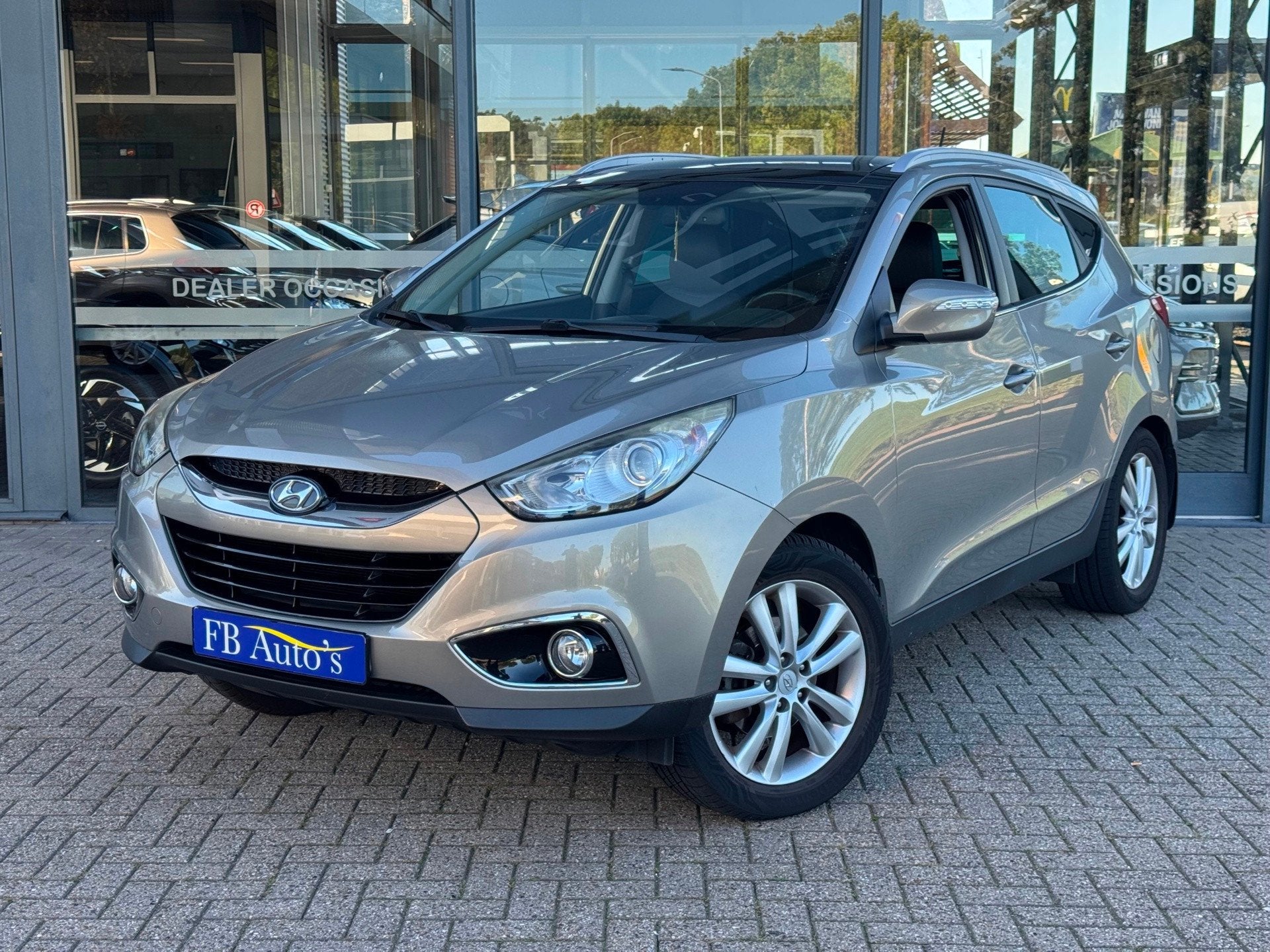 Hyundai Ix35 2.0i i-Catcher Airco Navi Automaat Cruise, Auto's, Gebruikt, Zwart, 4 cilinders, 163 pk
