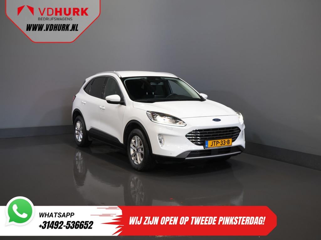 Ford Kuga 2.5 PHEV 225 pk Titanium Stoelverw/ Stuurverw/ Nav, Auto's, Stof, Gebruikt, 4 cilinders, Wit