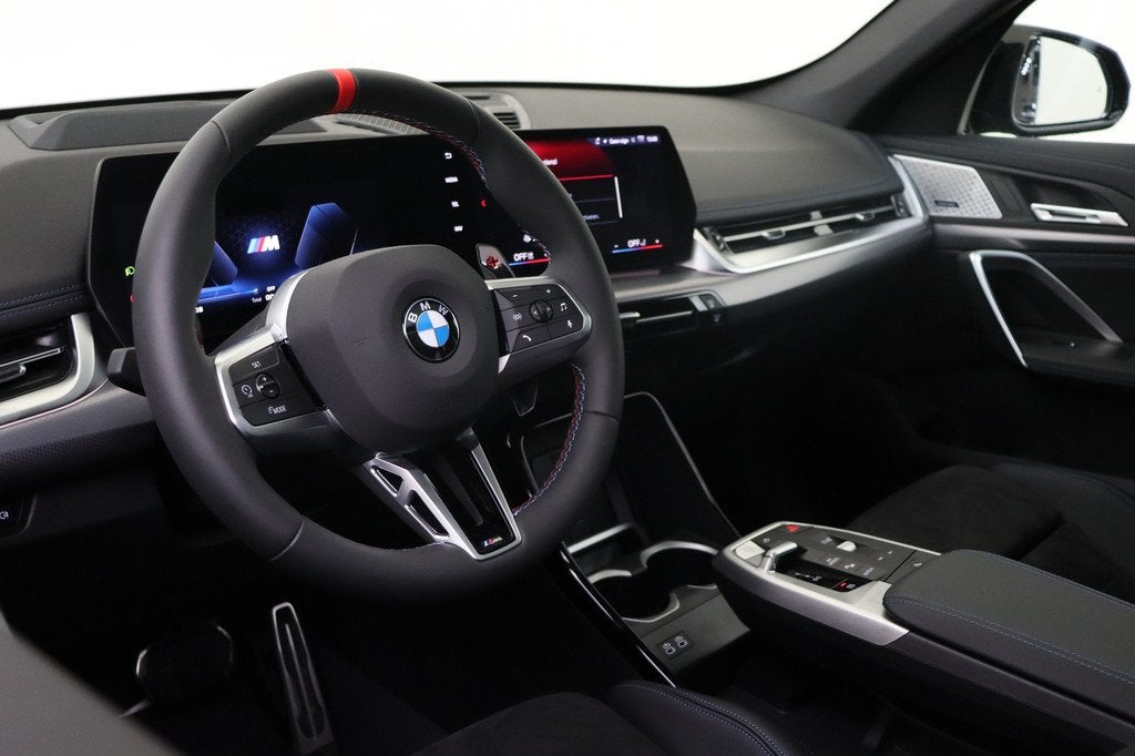 BMW X1 M35i High Executive Automaat / Panoramadak / M Sports, Auto's, BMW, 1998 cc, 4 cilinders, Met garantie (alle), Zwart