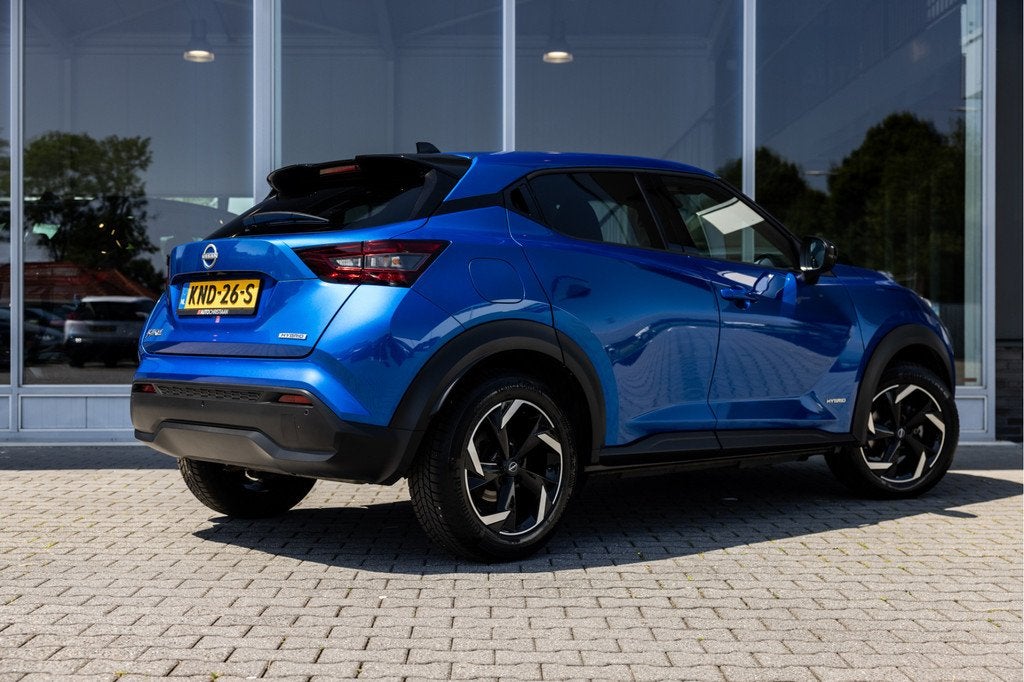 Nissan Juke 1.6 Hybrid Tekna | 360 Cam | Carplay | Adapt. Cr, Auto's, Nissan, 12 maanden, 1300 kg, Gebruikt, Blauw