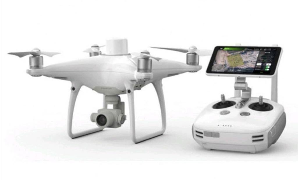 DJI Phantom 4 RTK met 3 accu's en reserve rotors nieuwstaat, Ophalen of Verzenden