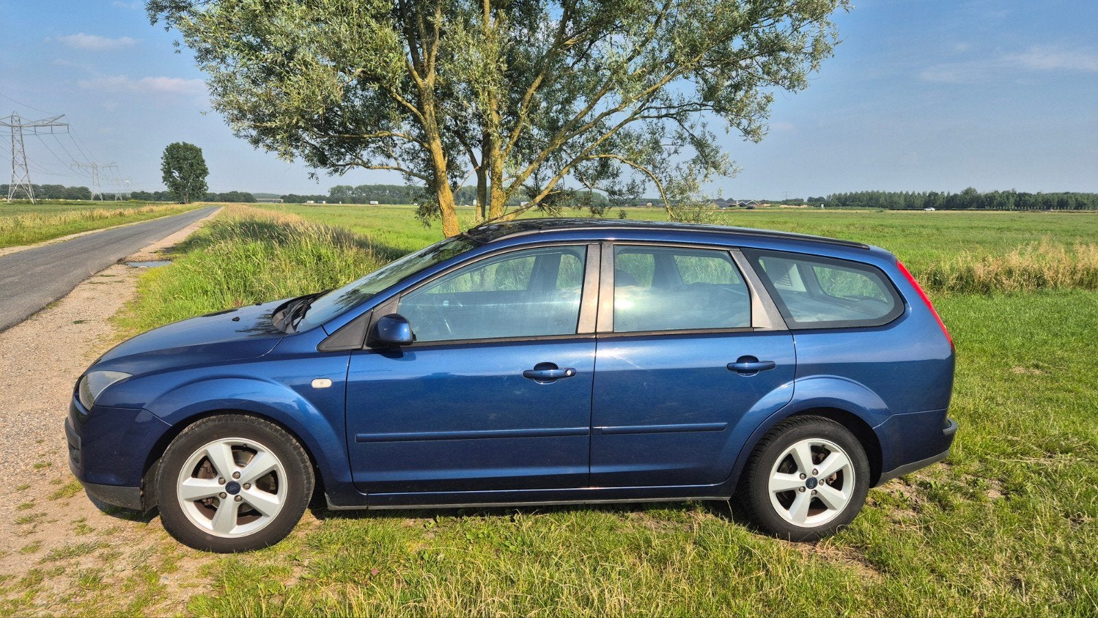 Ford Focus luxe uitvoering 1.6 automaat *nieuwe apk, Auto's, Ford, 1596 cc, 4 cilinders, Blauw, 100 pk