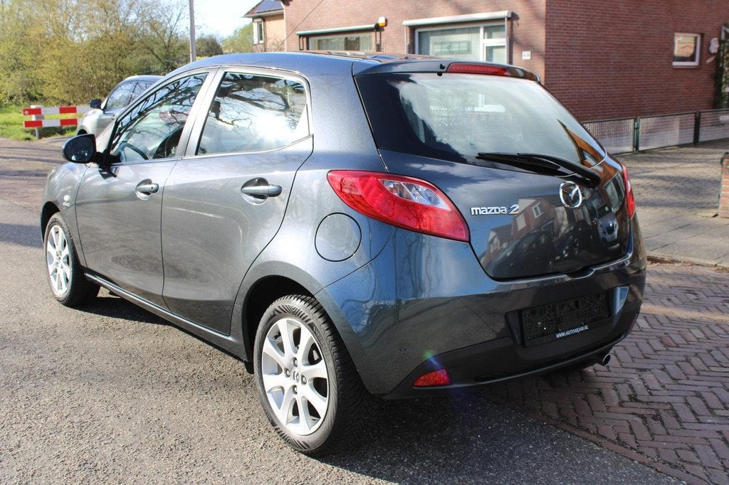 Mazda 2 1.3 TS Airco, Nwe APK, Garantie, Auto's, Mazda, Voorwielaandrijving, Stof, Gebruikt, Zwart