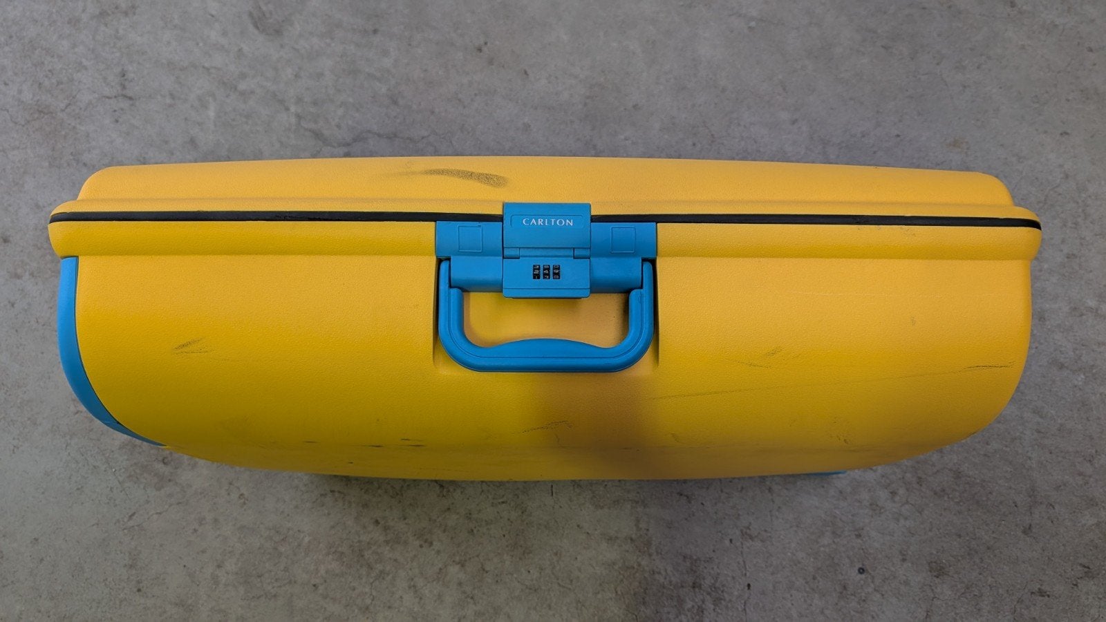 Gele Carlton koffer met slot en wieltjes, Gebruikt, Hard kunststof, 55 cm of meer, Ophalen