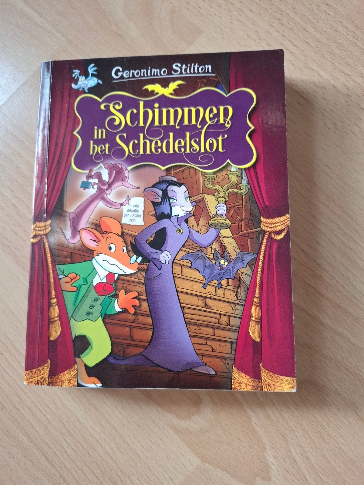 Geronimo Stilton Schimmen in het schedelslot, Ophalen of Verzenden, Zo goed als nieuw