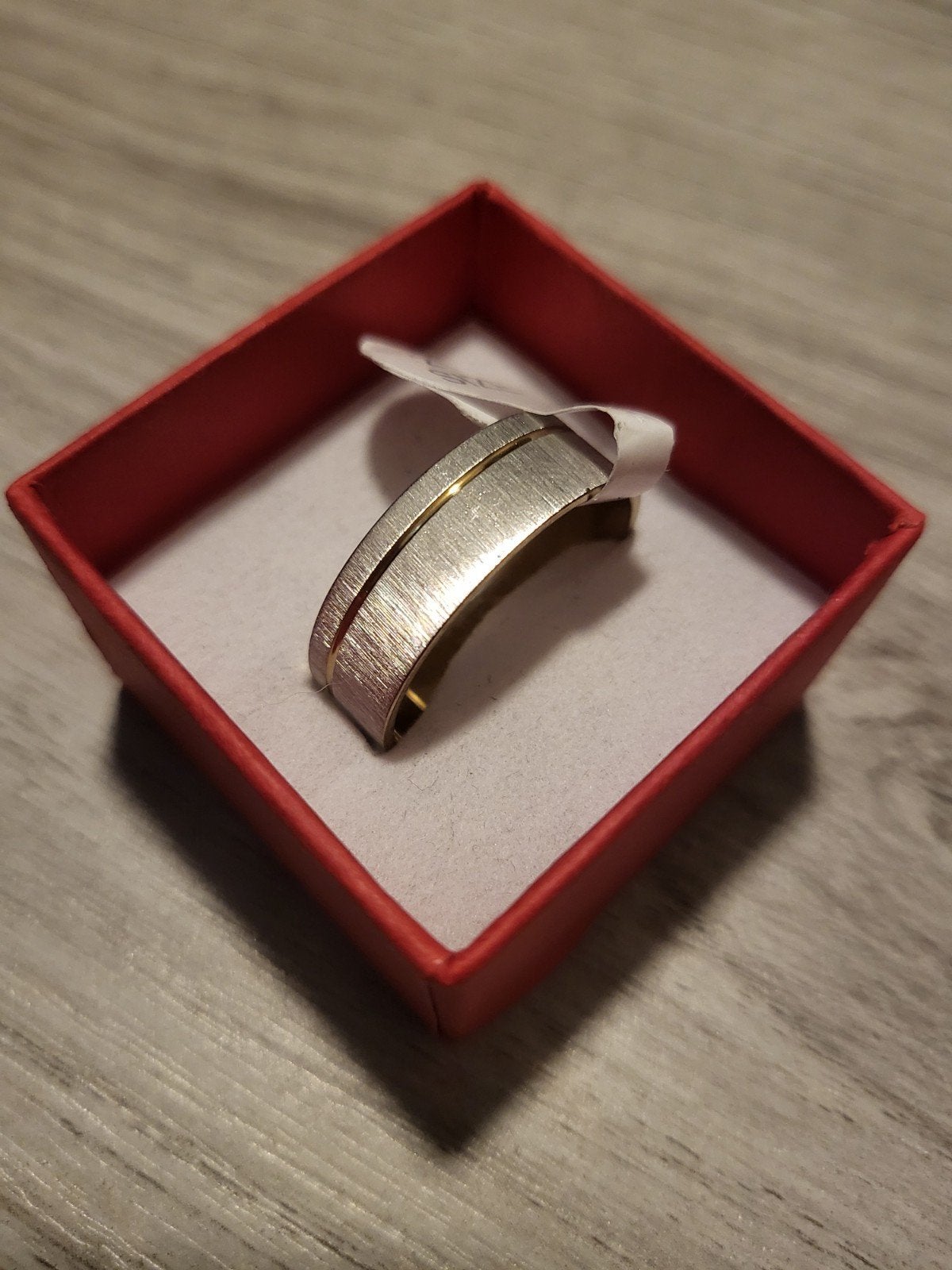 Nieuwe ring, maat 21, zilverkleurig met gouden accent, 20 of groter, IJzer of Staal, Nieuw, Ophalen of Verzenden