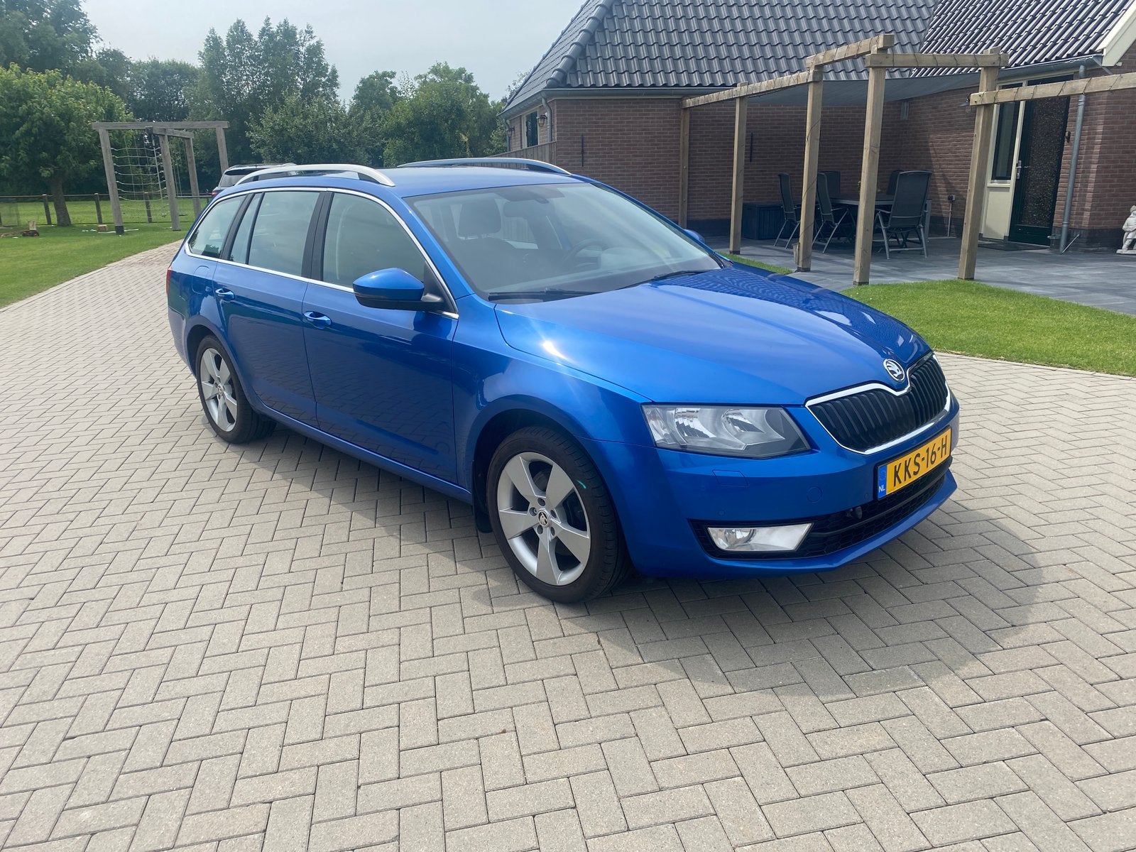 Skoda Octavia 1.8 TSI 180pk Greentech DSG 2013 Blauw, Auto's, Automaat, Zwart, Cruise Control, Stationwagon