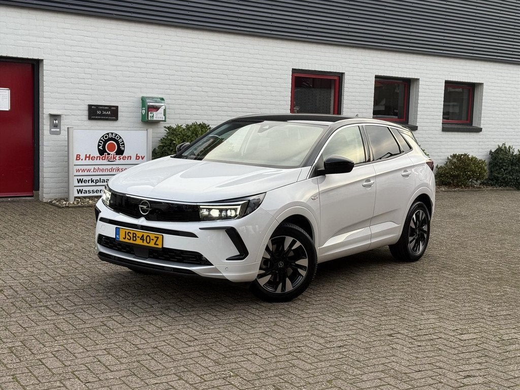 Opel Grandland 1.6 Turbo Hybrid 225pk Aut Ultimate/ All seas, Auto's, Opel, 4 cilinders, Wit, Bedrijf, Hybride Elektrisch/Benzine