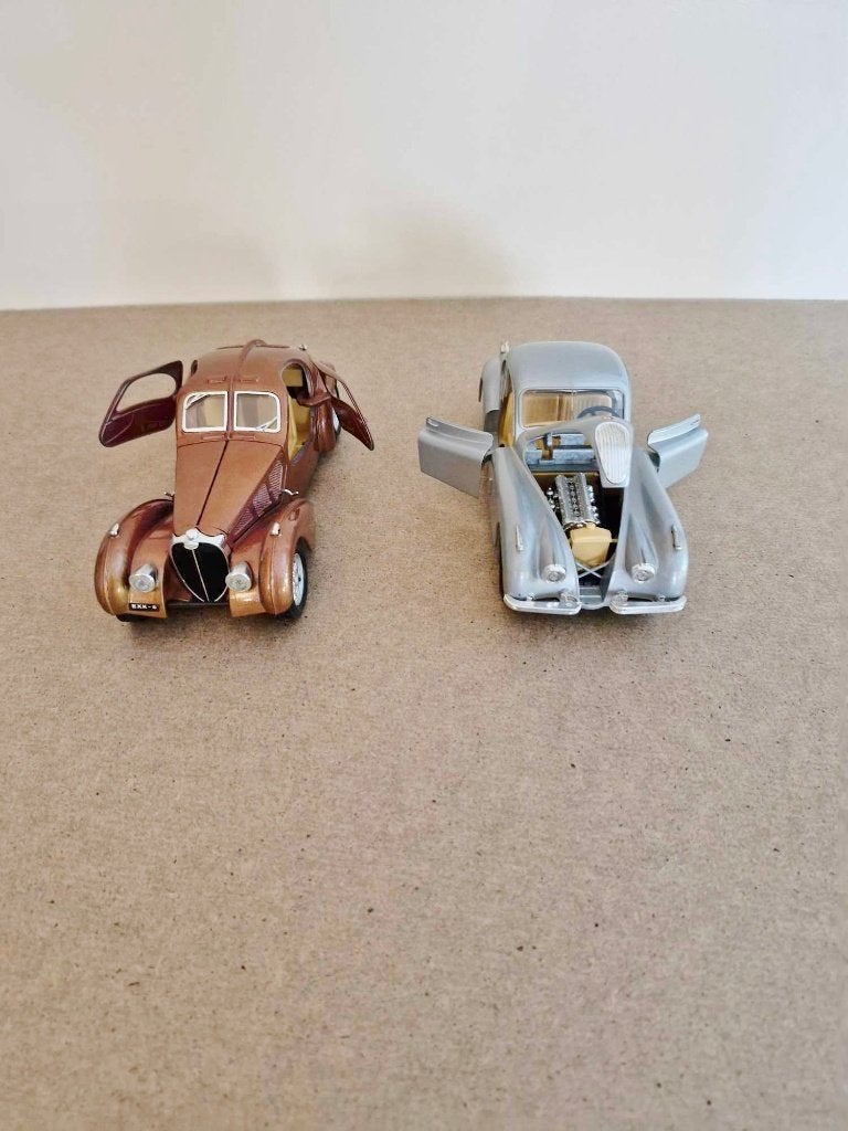 Jaguar XK120 1948+Bugatti Atlantic 1936Burago 1:24,onbespeel, Ophalen of Verzenden, Nieuw, Auto, Bburago