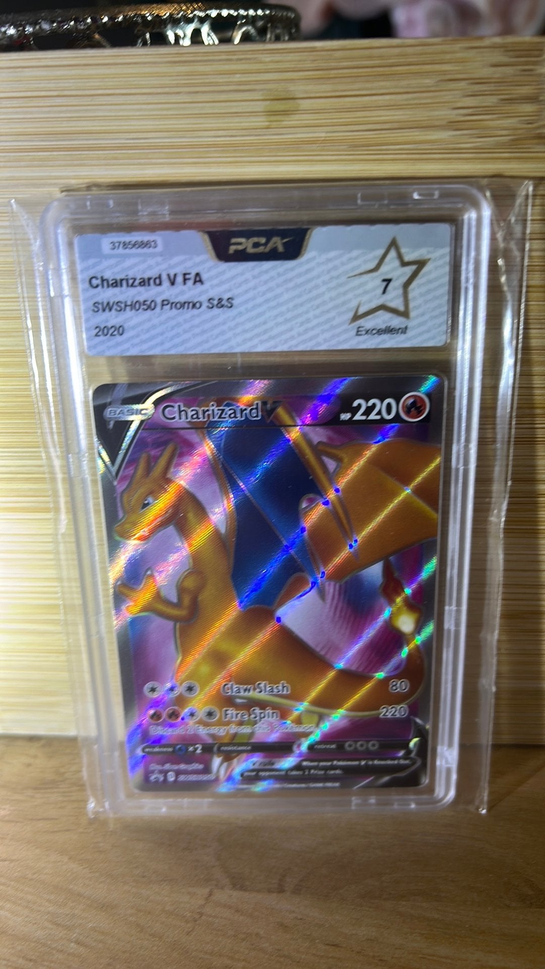 Charizard SWSH050 Promo PCA 7, Hobby en Vrije tijd, Verzamelkaartspellen | Pokémon, Ophalen of Verzenden, Zo goed als nieuw
